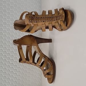 Brown leather, back-zip heel, size 7.5